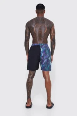 Sea Vibe Together -Sea Vibe Together male black warped spliced mid length swim 1