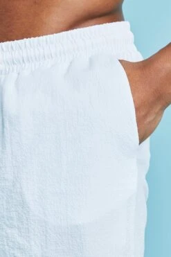 Mid Length Seersucker Swim Shorts 7 Mid Length Seersucker Swim Shorts -Sea Vibe Together male white mid length seersucker swim shorts 3